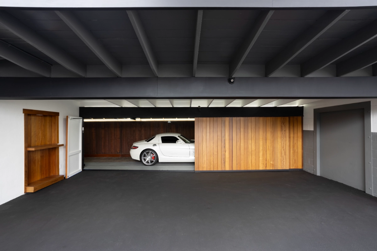 Concealed Vehicle Vault with Automated Wall System